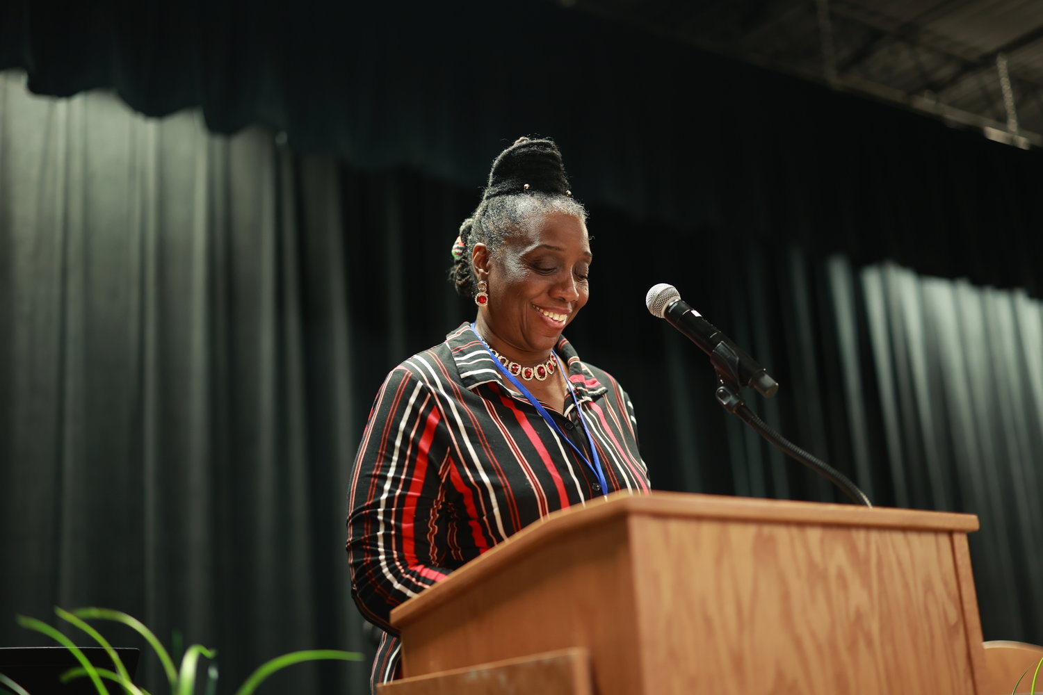 Stephanie Terry, the co-founder of WEBB Squared, welcomed guests at the "State of Black Entrepreneurship" at the Chatham County Agriculture & Conference Center on Friday.